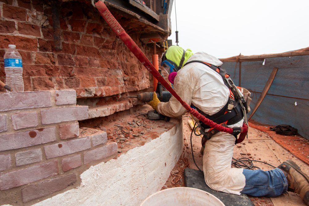 Hand-drilling out crumbling masonry